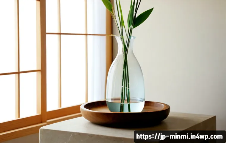 환경 친화적인 미니멀 럭셔리 제품 - Photorealistic luxury eco-friendly home essentials arranged on a pale limestone pedestal: a sculptur...